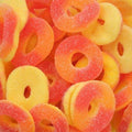 Close-up of colorful gummy rings with a focus on texture and color.