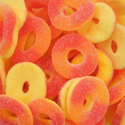 Close-up of colorful gummy rings with a focus on texture and color.